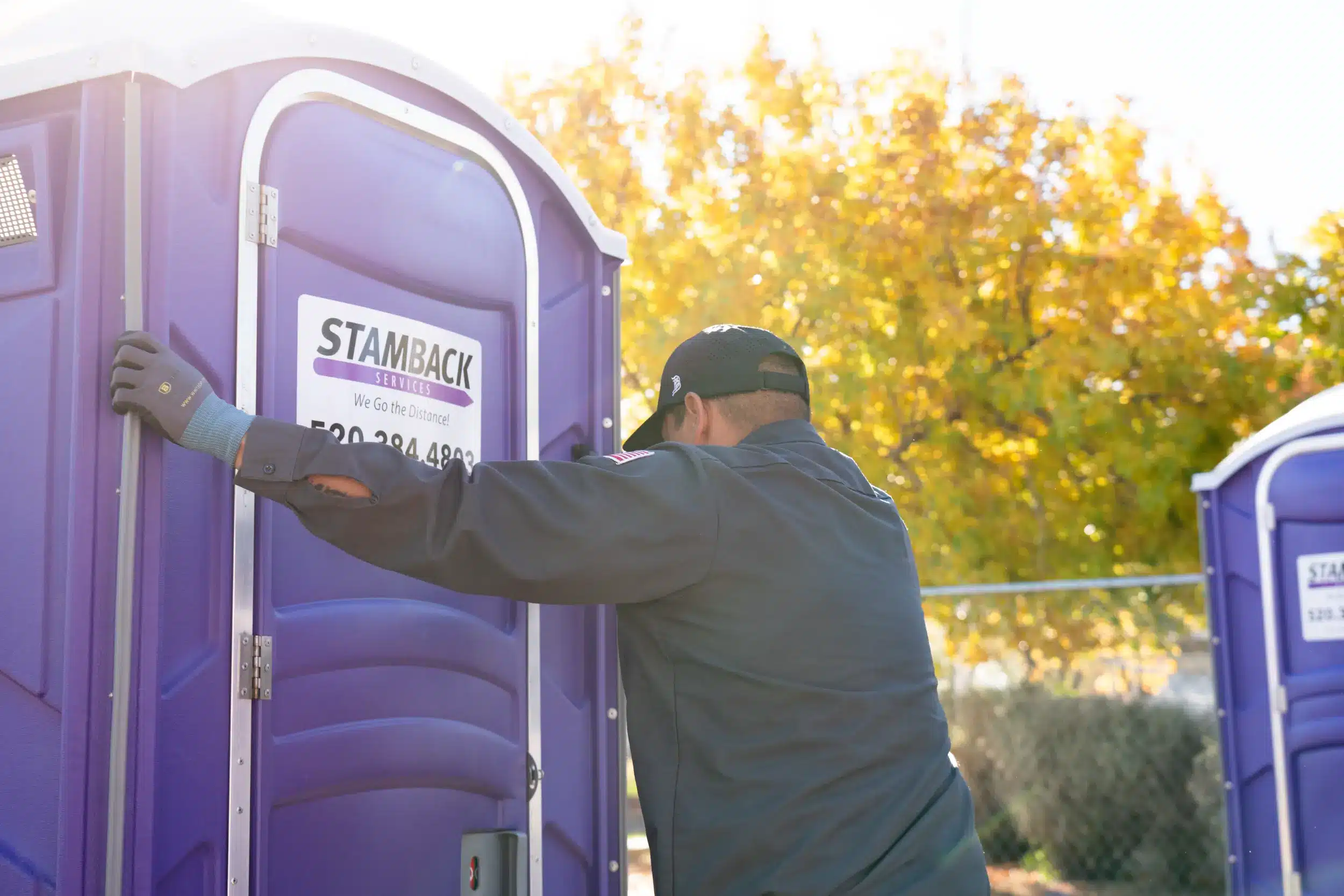 Stamback services team member hoisting a Standard Residential Unit